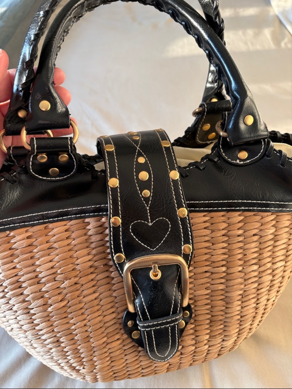 Woven Straw Handbag with Black Leather Trim and Gold Accents
